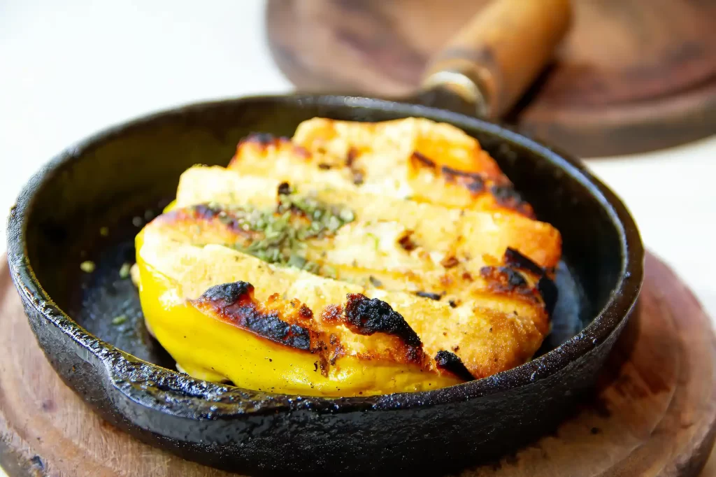 Restaurante Las Cholas with Provolone cheese, grilled in an iron cast mini pan